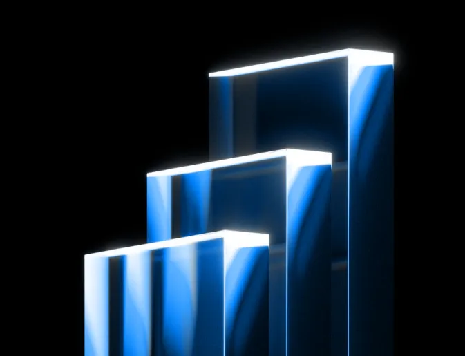 Illuminated blue glass steps rising in sequence